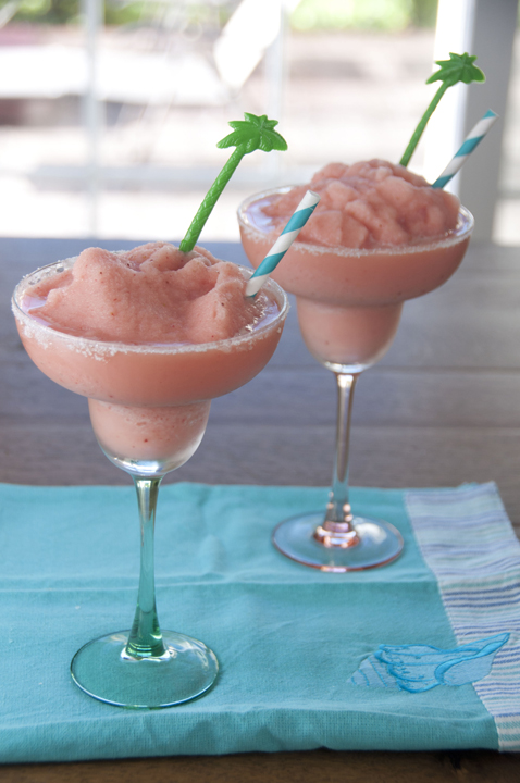 This frozen strawberry daiquiri recipe makes for a refreshing cocktail after a long, hot summer day. It is made with frozen fruit bars and I even included a kid-friendly version!
