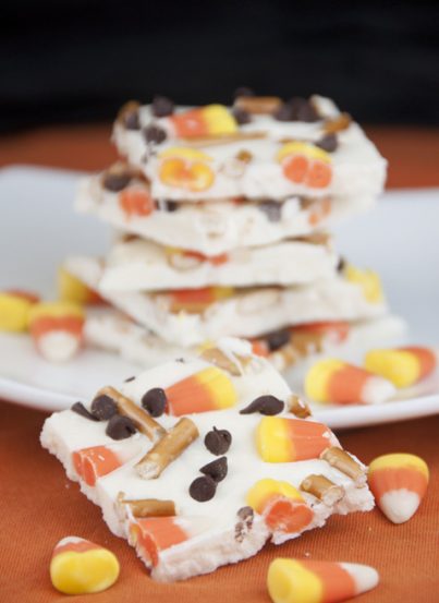 Candy Corn White Chocolate Bark made with pretzels, chocolate chips, and candy: fun treat for kids for Halloween!