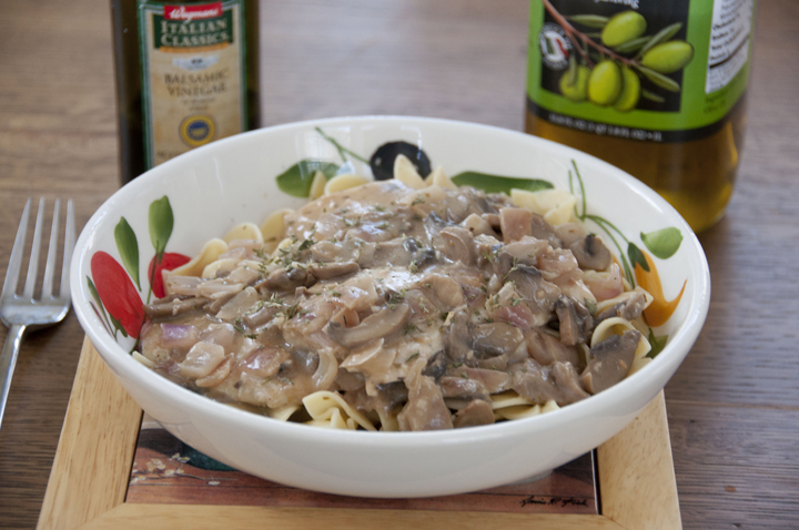 It only takes 30 minutes to prepare this Chicken and mushrooms in a light balsamic cream sauce with onions and garlic.  Quick and easy!