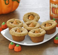 These peanut butter cookie cups are super fun with pumpkin spice Hershey's Kisses added to them. Kids of all ages will love this fall treat.