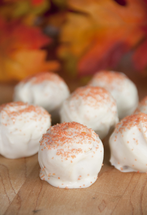 Rich and sweet, these cute cream cheese and crushed Pumpkin Spice Oreo Truffles, or cookie balls, are the perfect dessert "treat" for Halloween.