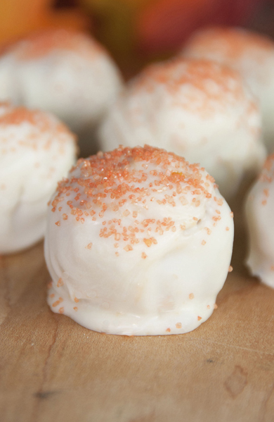 Sweet and adorable cream cheese and crushed Pumpkin Spice Oreo cookie balls are the perfect dessert for Halloween.