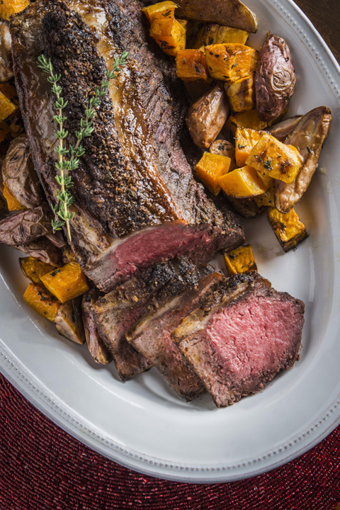 Make this year's holiday feast an effortlessly elegant event with this tender, juicy strip roast recipe rubbed with garlic and fresh thyme.