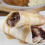 This copy-cat Earl of Sandwich recipe piled high with slow roasted turkey, stuffing, gravy and cranberry sauce, will put your Thanksgiving leftovers to good use.
