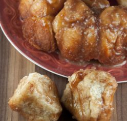 An easy recipe for cinnamon monkey bread. This ooey-gooey bread has cinnamon and is drizzled with a warm maple glaze.