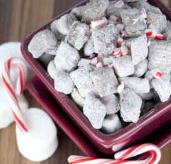 Puppy Chow muddy buddies made with Rice Chex, hot chocolate mix, and melted chocolate for an easy Christmas or cold weather snack!