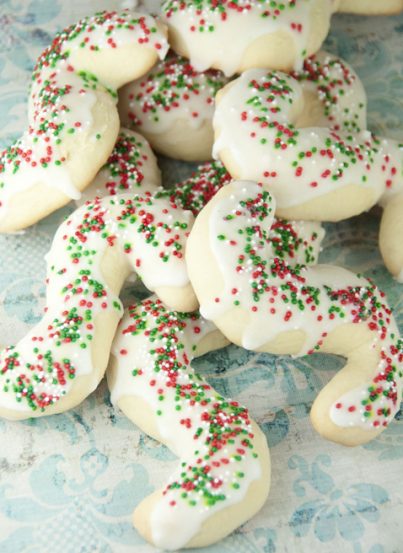 Old recipe for Italian Anisette Cookies, or "S" cookies, just like my husband's grandma used to make. These have icing and sprinkles on them and will be a great addition to your holiday cookie trays.