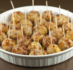 Sausage Cheese Balls make for the perfect little appetizer to serve to your guests at any holiday party, and especially for New Year's Eve.
