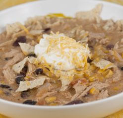 This no-fuss Chicken Tortilla Soup is quick to make, incredibly flavorful, and filling and garnished with crushed corn tortilla chips!