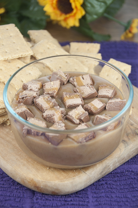 This candy bar Milky Way dip is the perfect sweet appetizer to feed a crowd at a party using leftover candy.  This is great for a quick chocolate fix.