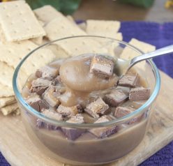 This Milky Way dip is the perfect sweet appetizer to feed a crowd! Make this with leftover candy you have laying around as an easy dessert for any party.