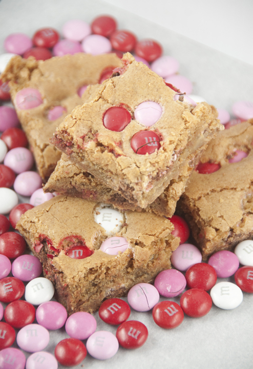 Brown Sugar M&M Blondies are an easy dessert to make for Valentine's day or any occasion. They are, soft, chewy and full of flavor!