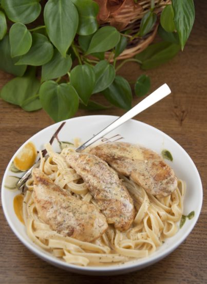 Chicken Lazone is a creamy, low carb New Orleans dish that is delicious served on it's own. You can serve it over pasta or mashed potatoes for a more filling meal.