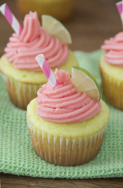 Strawberry Lime Margarita Cupcakes full of lime, tequila and strawberry frosting - a perfect dessert to celebrate any day of the week.