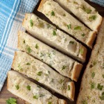 This Louisiana Garlic Bread is a wonderful accompaniment to any meal and could not be tastier or simpler to make. Minced fresh garlic and lemon are the key to this flavorful buttery bread.