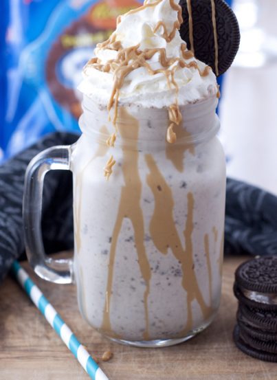 Vanilla ice cream, Reese’s Peanut Butter Cup Oreos and peanut butter combine to create a thick, rich Peanut Butter Cup Oreo Milkshake full of peanut butter goodness.