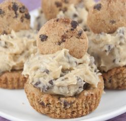 This is the ultimate cookie cup recipe: thick chocolate chip cookies baked in a cupcake tin with rich, egg-free chocolate chip cookie dough frosting mounded on top.