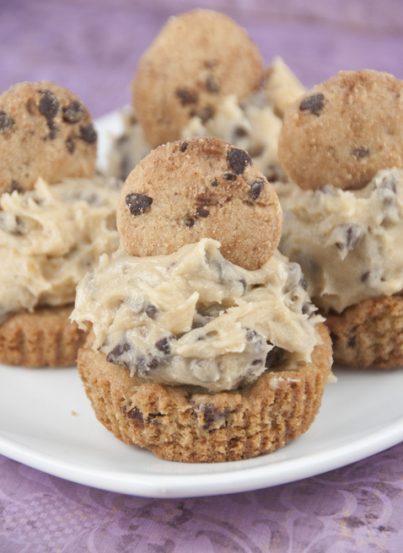 This is the ultimate cookie cup recipe: thick chocolate chip cookies baked in a cupcake tin with rich, egg-free chocolate chip cookie dough frosting mounded on top.