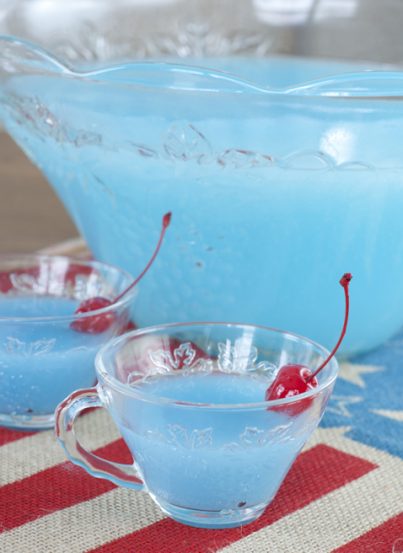 Delicious Blue Piña Colada Party Punch that is kid-friendly and perfect for 4th of July, a baby shower, or summer birthday parties!