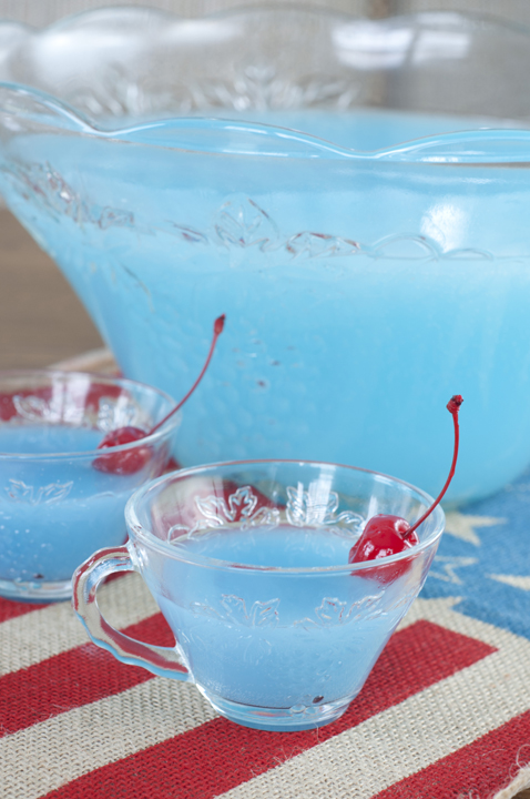 Delicious recipe for Blue Piña Colada Party Punch that is kid-friendly and perfect for 4th of July, a baby shower, or summer birthday parties!