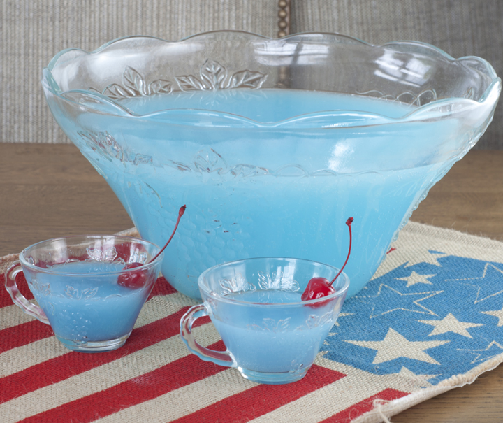 Easy Blue Piña Colada Party Punch recipe that is kid-friendly and perfect for 4th of July, a baby boy baby shower, or Frozen birthday parties!