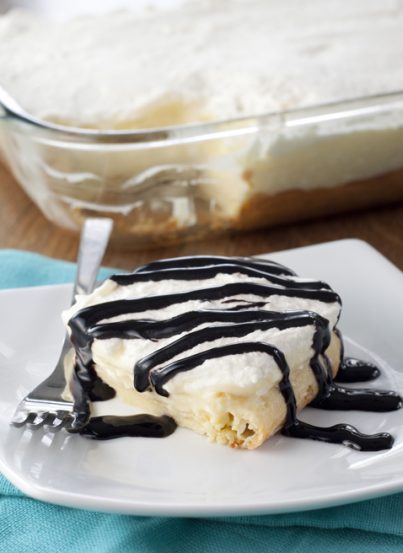 This dessert recipe for Chocolate Eclair Cake is your favorite oblong French pastry made into a cake!
