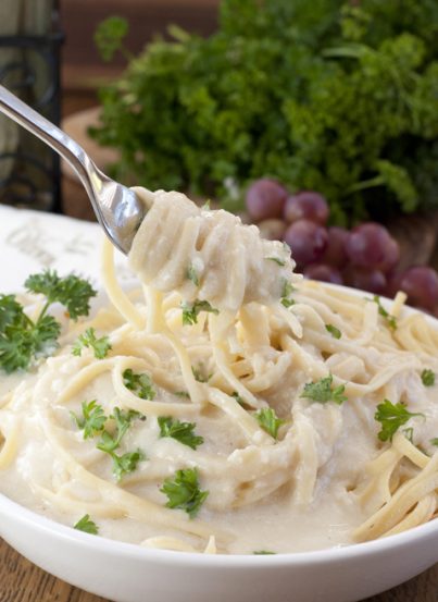 Rich, Creamy Greek Yogurt Alfredo Sauce made is your favorite Italian pasta sauce with amazing flavor but without all the guilt!