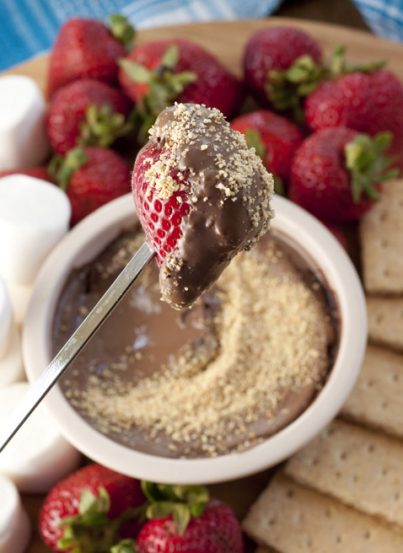 Crock Pot S'mores Fondue Dip for dessert served along with your favorite dippers.