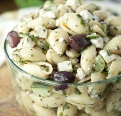 This side dish recipe for Greek Pasta Salad has all of the refreshing flavors of a classic Greek salad with cucumber, olives, and feta cheese. Everyone at your picnic will love this!