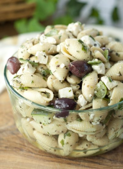 This side dish recipe for Greek Pasta Salad has all of the refreshing flavors of a classic Greek salad with cucumber, olives, and feta cheese. Everyone at your picnic will love this!