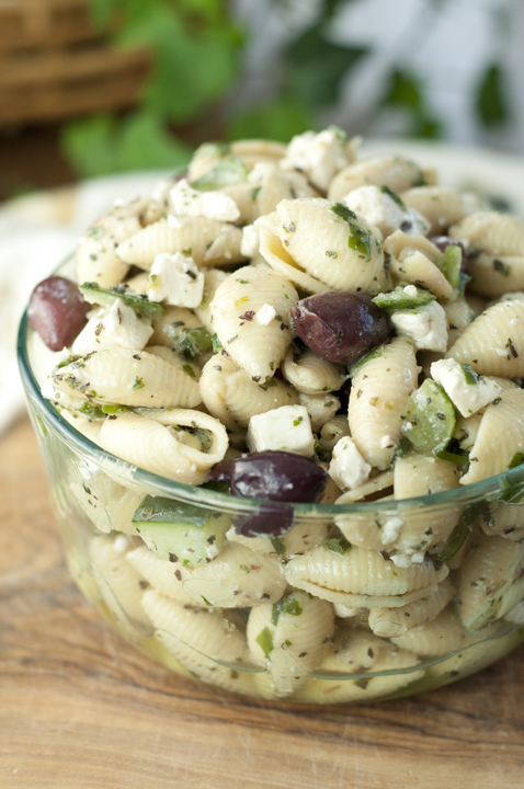 This side dish recipe for Greek Pasta Salad has all of the refreshing flavors of a classic Greek salad with cucumber, olives, and feta cheese. Everyone at your picnic will love this!