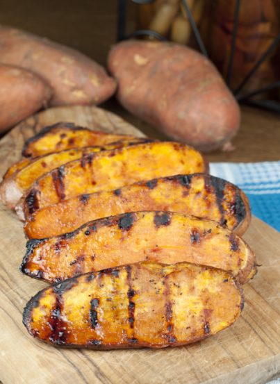 Grilled Sweet Potatoes with a sweet Cherry Glaze are the perfect addition to your summer cookout or BBQ. They are easy to make and the glaze will be your new favorite!