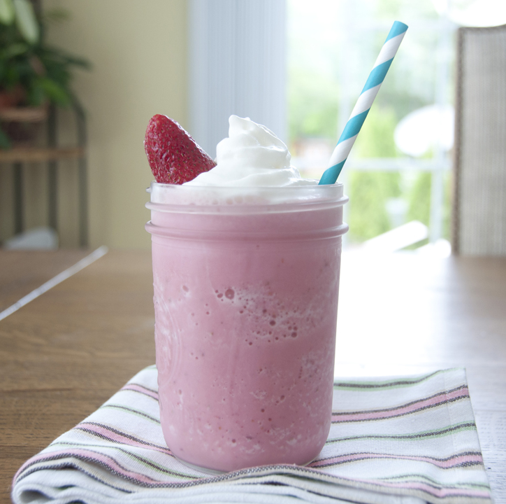 Copycat Starbucks Coffee Strawberries & Creme Frappuccino. This Strawberries and Cream Blended Drink is what originally got me hooked on Starbucks!