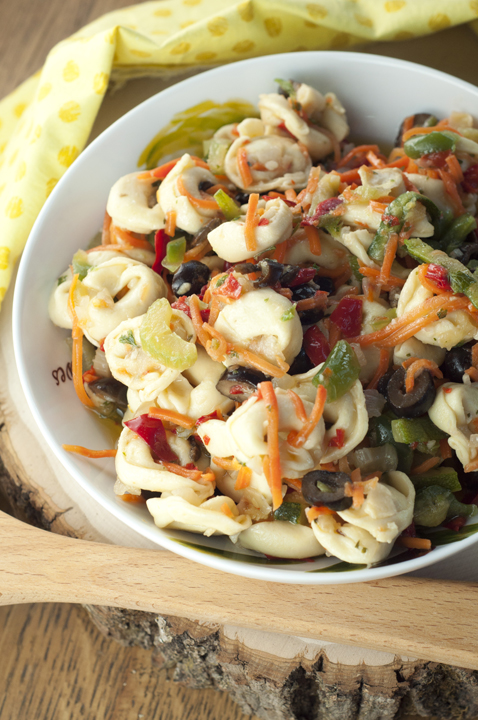 An easy and delicious cold Cheese Tortellini Pasta Salad with Honey Vinaigrette tastes like an Italian antipasto platter and is loaded with veggies for a great side dish recipe.