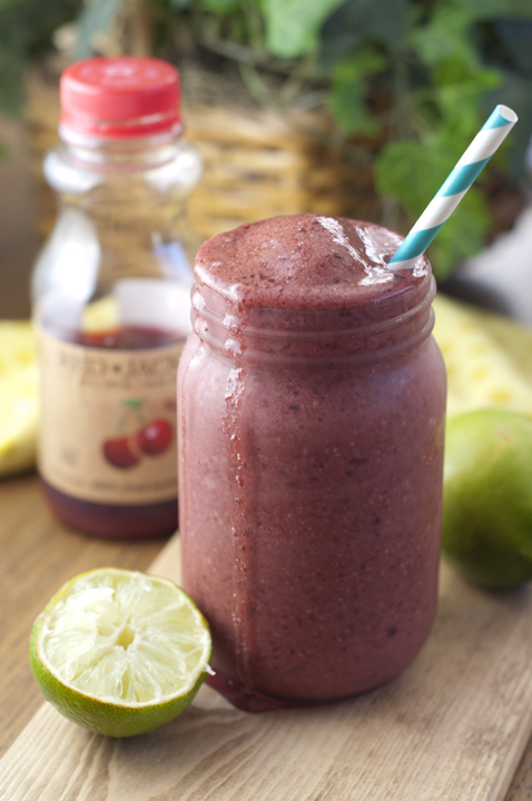 Creamy, refreshing, and made with fresh cherry juice, this Cherry Coconut Lime Smoothie recipe will hit the spot any day of the year!