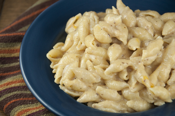 Creamy Macaroni and Cheese made with stove top apple butter and sharp cheddar cheese.  This would be a great holiday side dish!