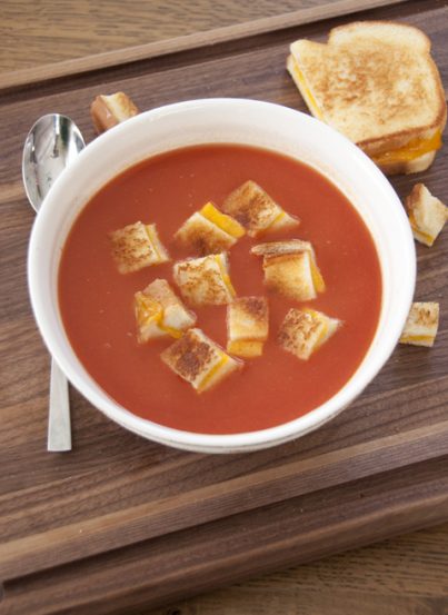 Easy Tomato Soup and Grilled Cheese Croutons is a creative lunch or dinner recipe that will warm you up on a cold day!