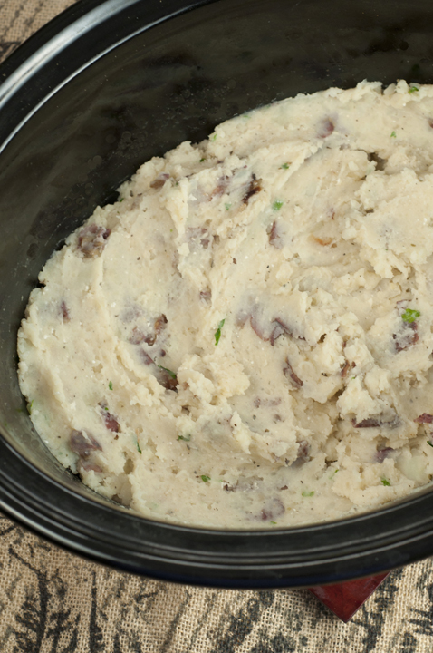 Crock Pot Mashed Potatoes cooking in the slow cooker.