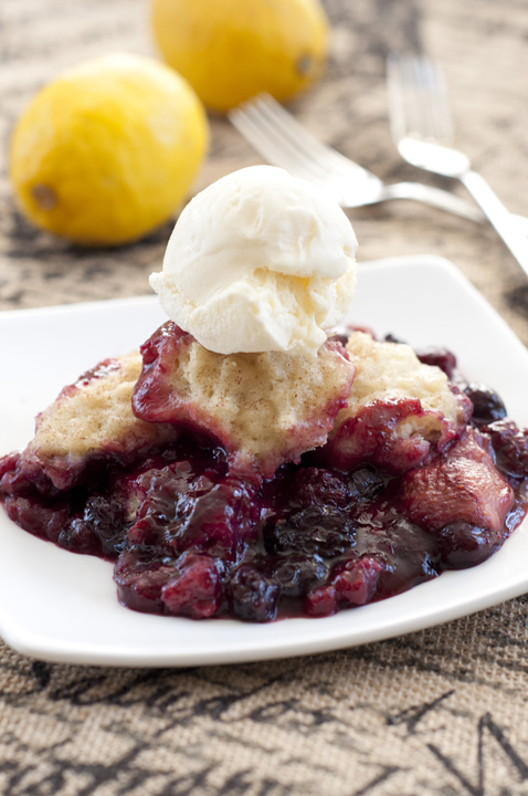Crock Pot Mixed Berry Cobbler recipe is perfect for the holidays and creates a deeply flavorful dessert with very little prep time!