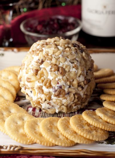 Made with only four ingredients, this Cranberry Walnut Cheese Ball recipe is a delicious appetizer to start off any meal or holiday party. It is the ultimate wine complement!