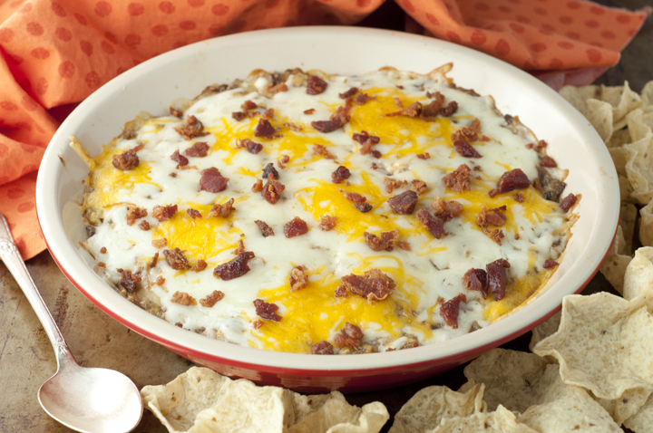Hot Double Bacon Cheeseburger Dip recipe is the perfect Super Bowl snack that has all of your favorite flavors made into a winning dip!