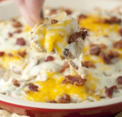 Hot, Cheesy Bacon Cheeseburger Dip recipe is the perfect game day snack that has all of your favorite flavors of a bacon double cheeseburger turned into an addicting dip!