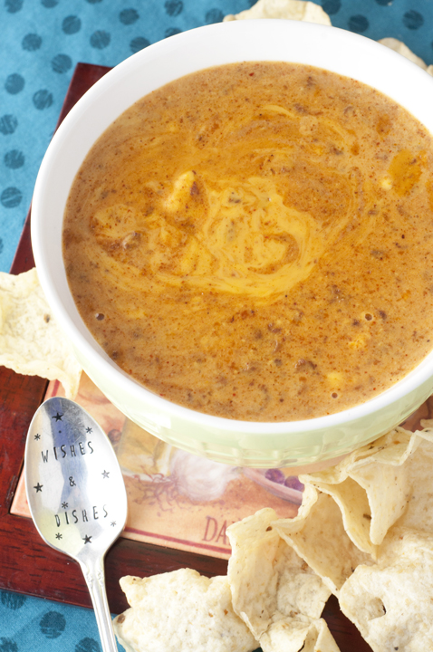 Crock Pot Chili Queso Dip is a Copycat Chili's queso dip recipe and will be a hit appetizer at any holiday, football party or Super Bowl party!