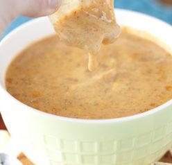 Crock Pot Chili Queso Dip tastes just like Chili's restaurant queso dip and will be the star appetizer at any holiday gathering and your Super Bowl party!