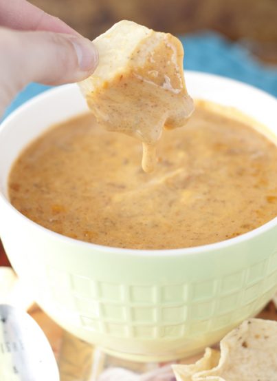 Crock Pot Chili Queso Dip tastes just like Chili's restaurant queso dip and will be the star appetizer at any holiday gathering and your Super Bowl party!