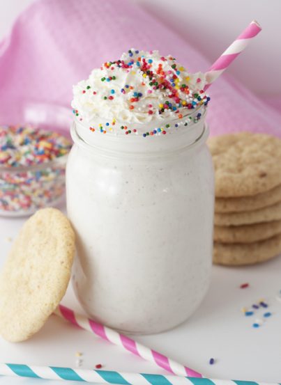 This recipe for a Frosted Sugar Cookie Protein Smoothie with a special secret ingredient is a protein-packed healthy snack, breakfast, workout boost, or afternoon pick-me-up!