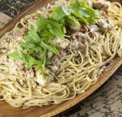Creamy Chicken Bellagio dinner Cheesecake Factory recipe is chicken and pasta dish with crispy, juicy pan-fried chicken, spaghetti coated in a creamy Parmesan pesto cream sauce and topped with prosciutto and a simple arugula salad!