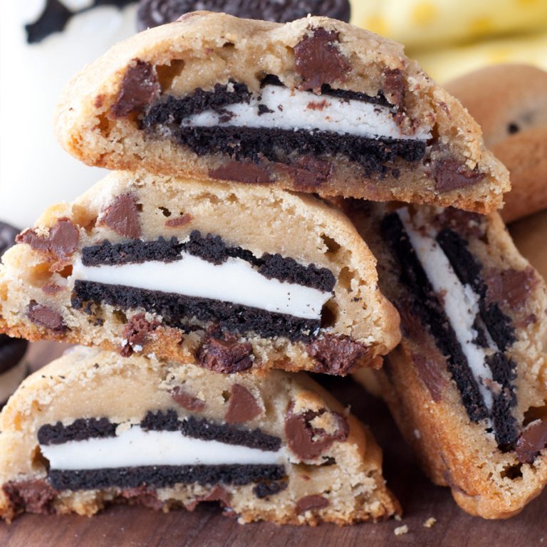 Huge, gooey, soft Oreo Stuffed Chocolate Chip Cookies are two of your favorite cookies turned into one totally sinful dessert recipe that everyone will adore!