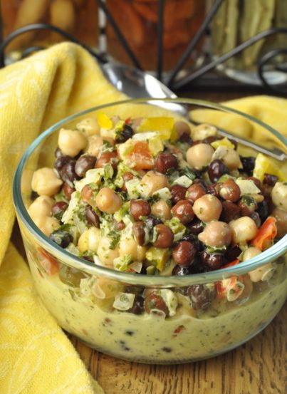 Summer Chickpea Black Bean Salad recipe that is low in fat and high in protein and makes an amazing side dish for your summer picnics or BBQ! You could also serve this alone or pair it with some a toasted baguette or bread to make a great appetizer or snack.