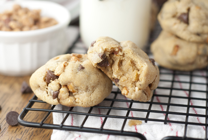 Easy, Thick, Chewy Chocolate Chip Peanut Butter Cookies recipe with crushed honey roasted peanuts that you will fall in love with. These are slightly crispy on the edges while gooey and soft on the inside. 